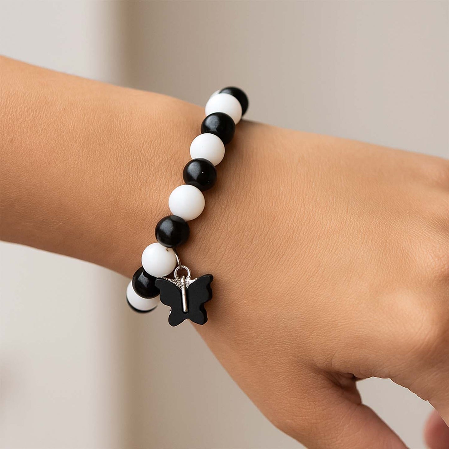black and white beaded bracelet with cross pendant pack of 1