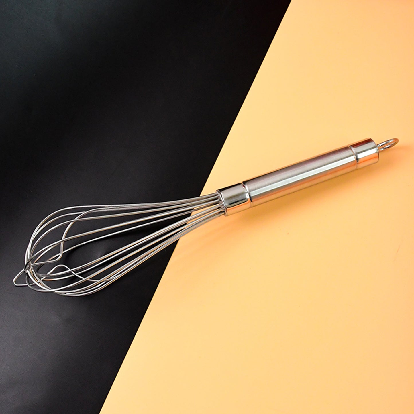 large stainless steel hand whisk for mixing
