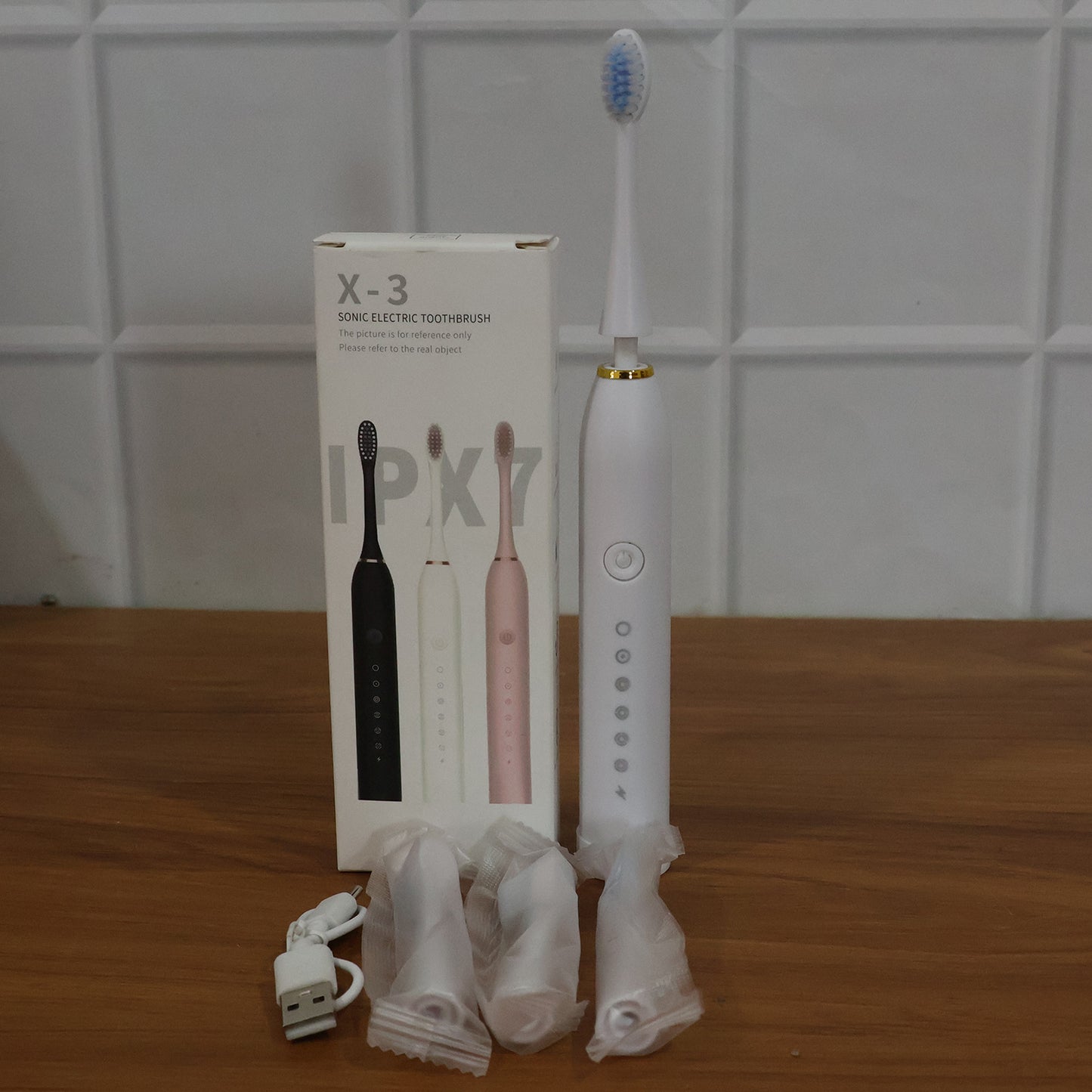 white rechargeable electric toothbrush with 4 brush heads pack of 1