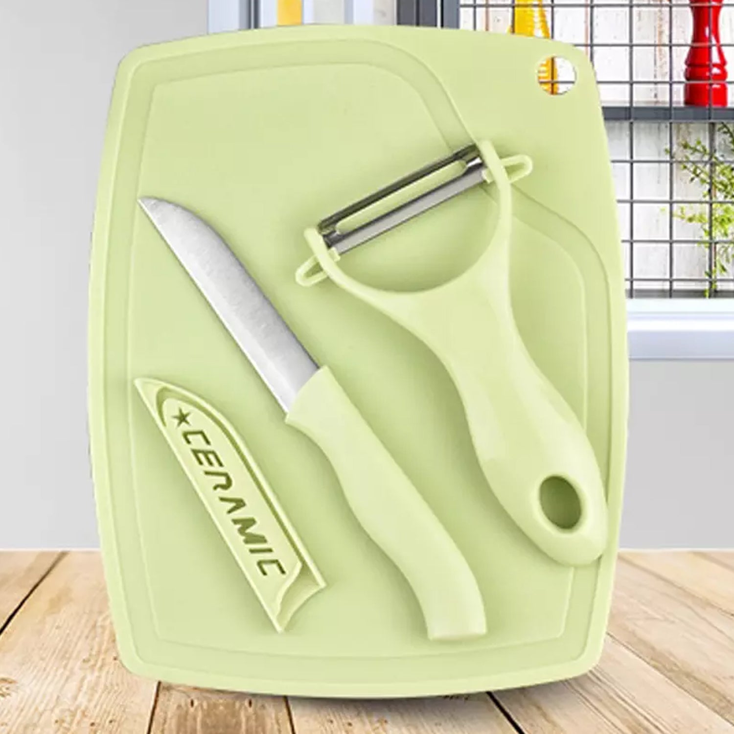 kitchen peeler and knife set with plastic handles and stainless steel blades