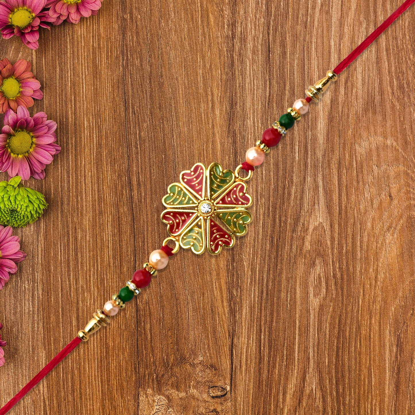 Traditional Kundan Rakhi With Golden Floral Base And Rudraksha Beads