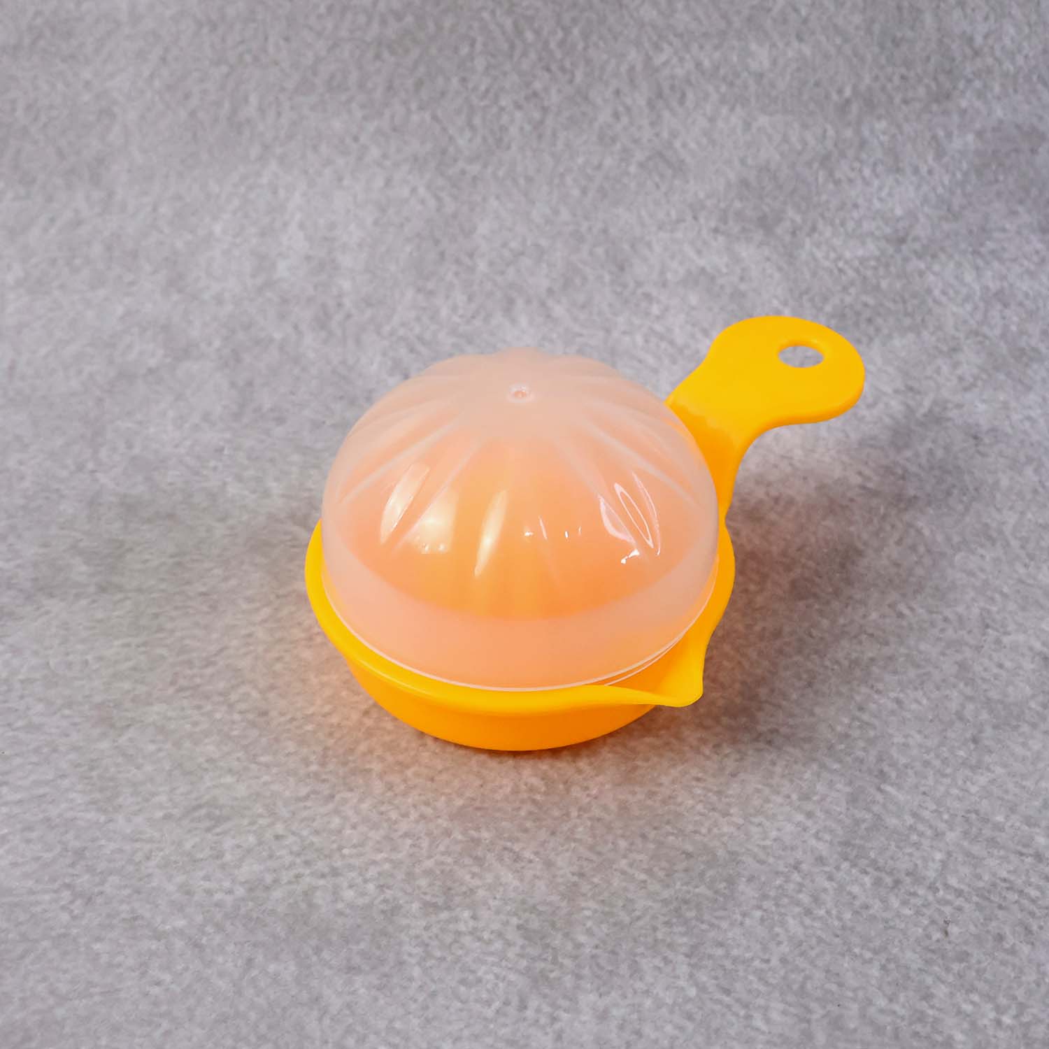 hand-operated citrus juicer compact design